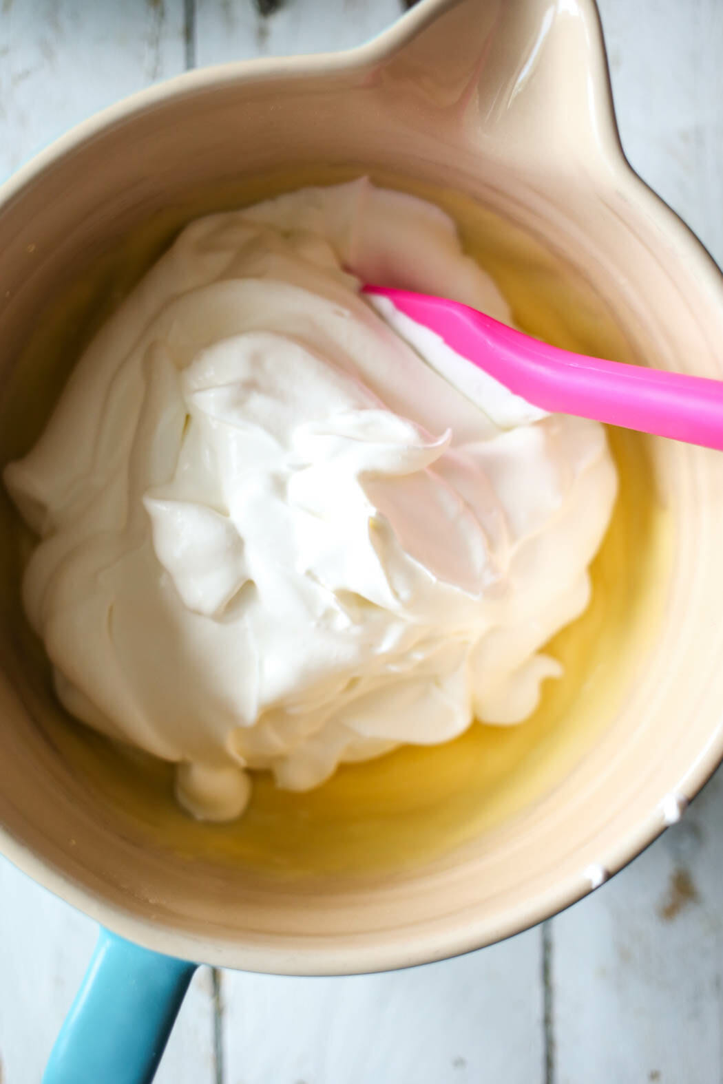folding in whipped cream to easiest best banana cream pie 