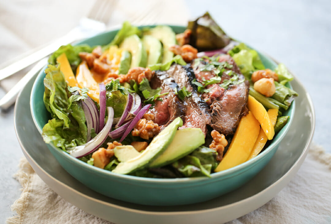 Steak and Mango Salad in serving bowl