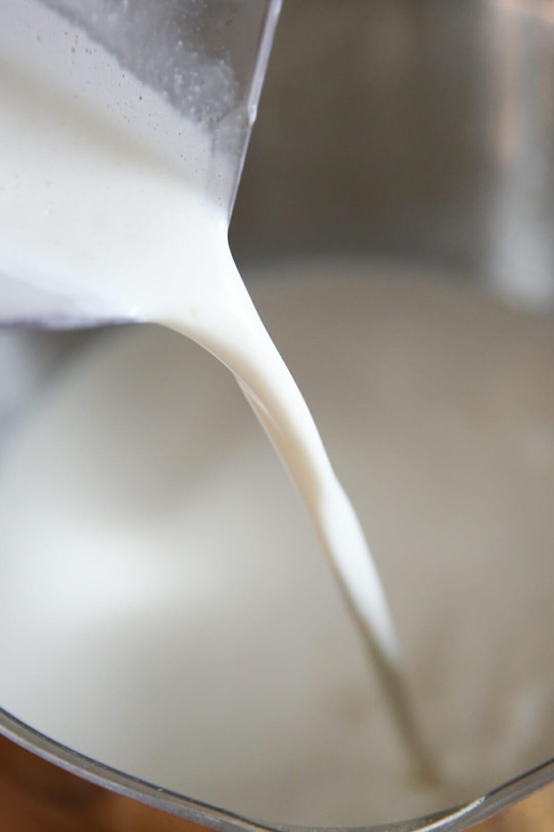 Pouring milk mixture into blender