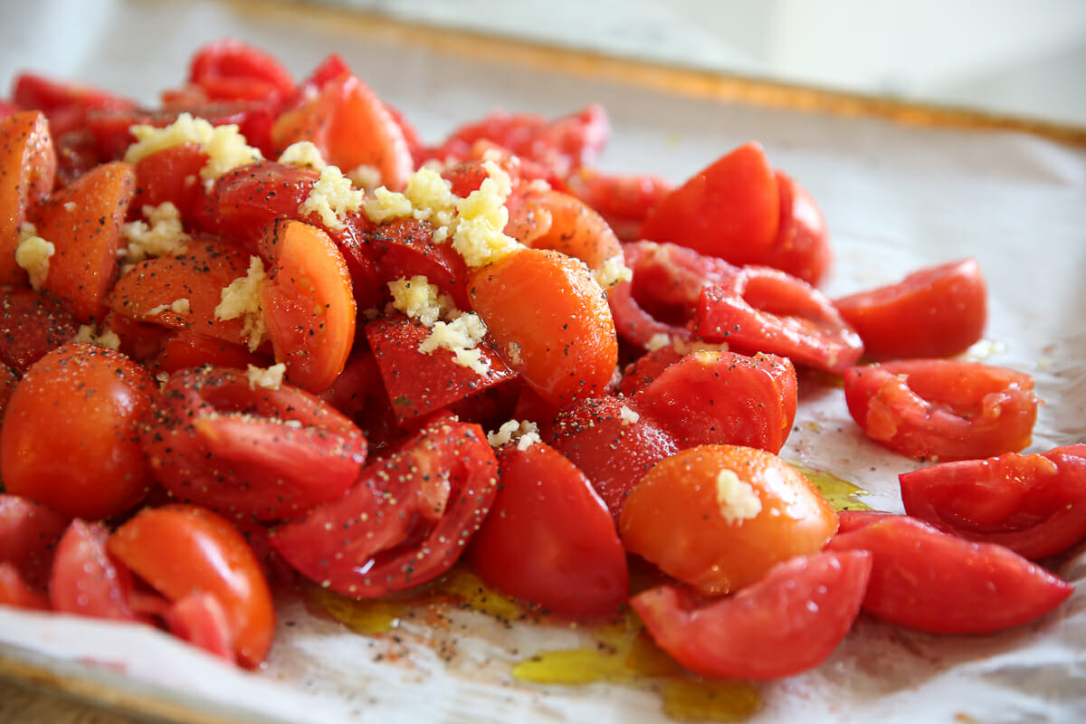 tomatoes coated in olive oil and garlic