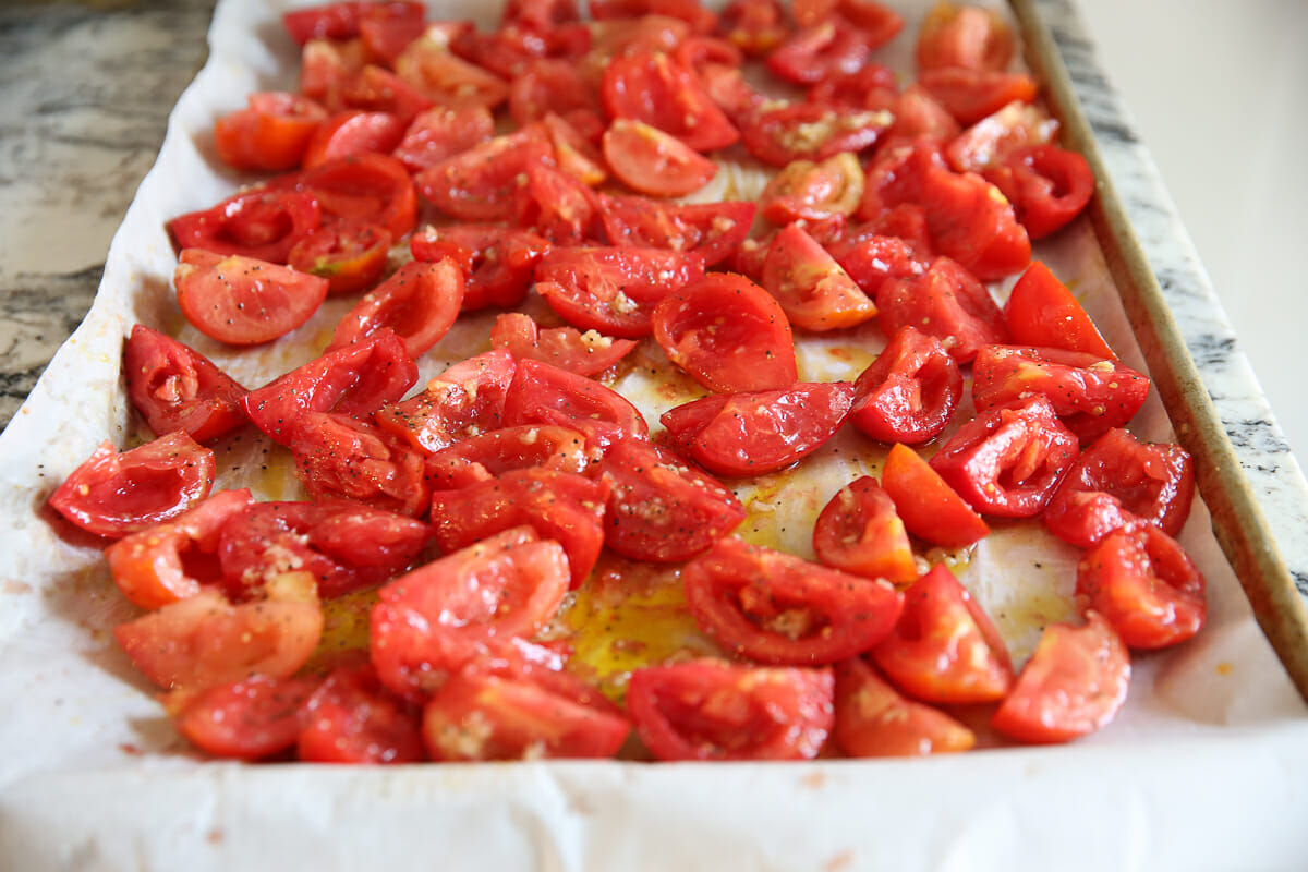 oven roasted tomatoes on baking sheet