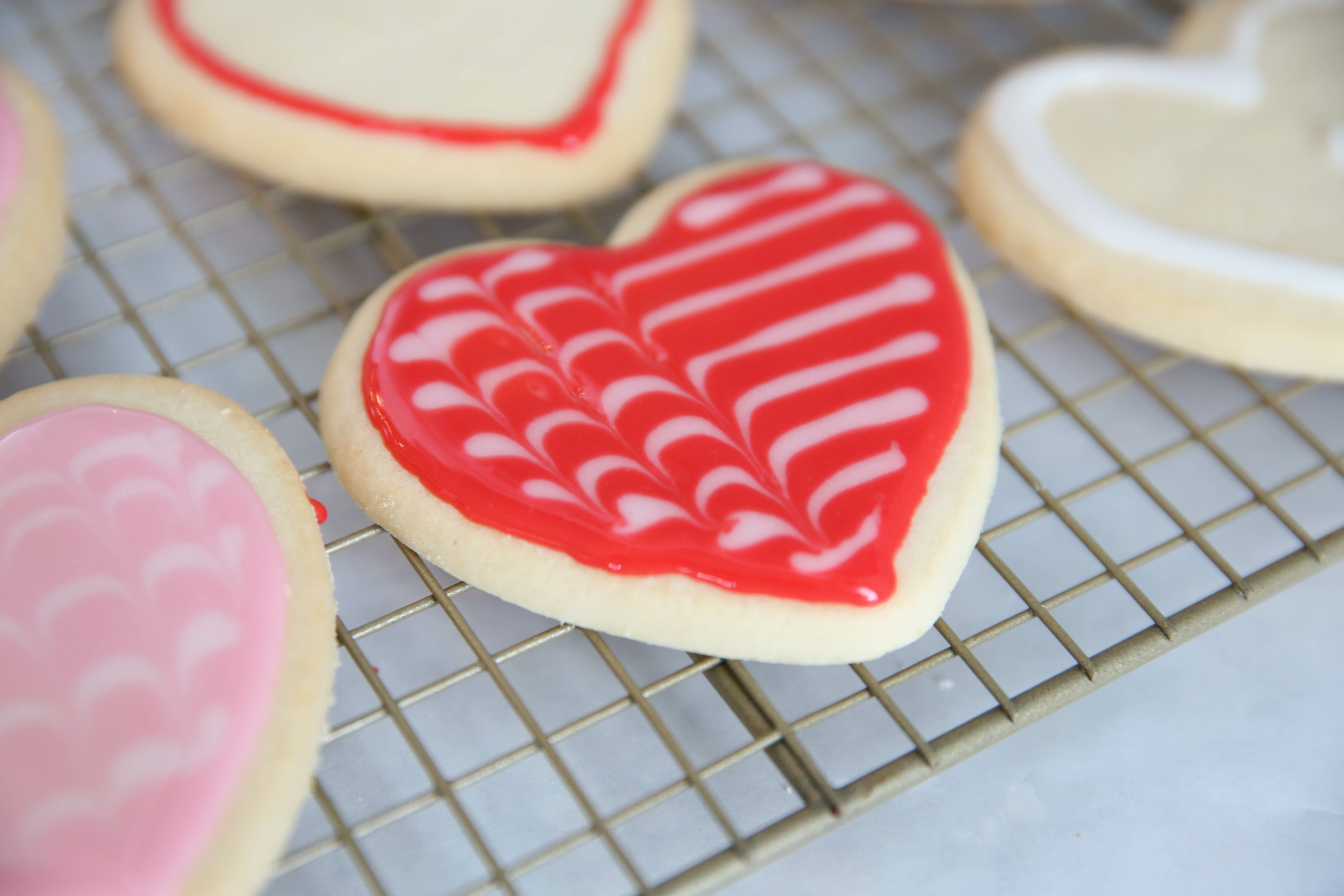 Best Sugar Cookie Icing mixed on sugar cookie