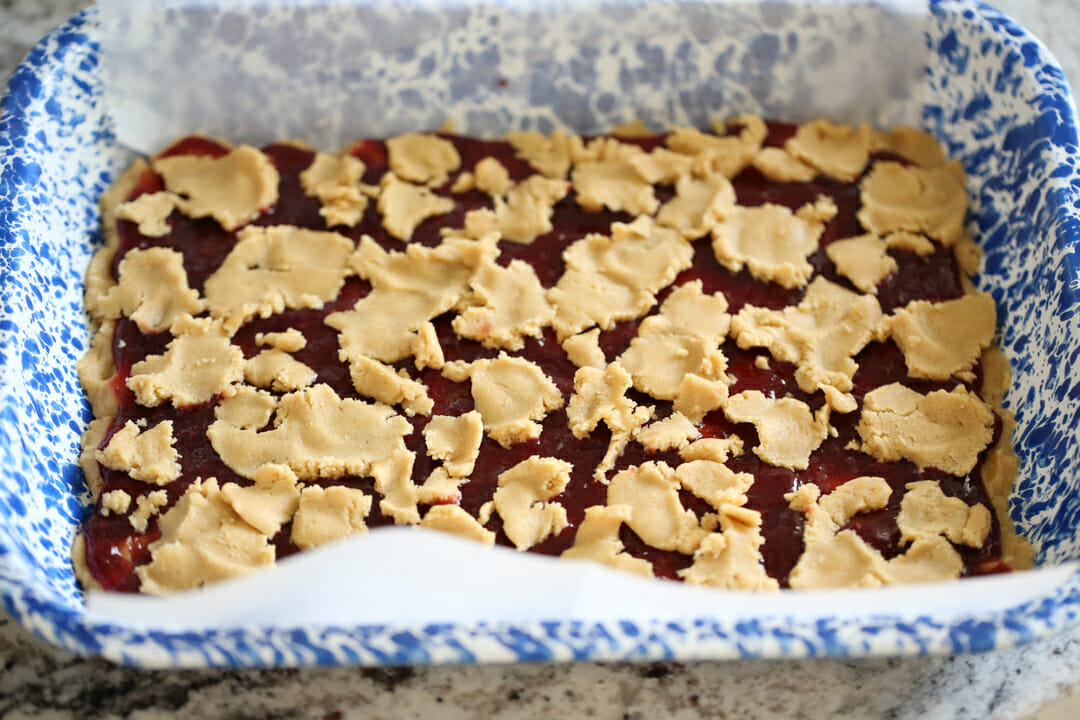 peanut butter and jam bars in pan
