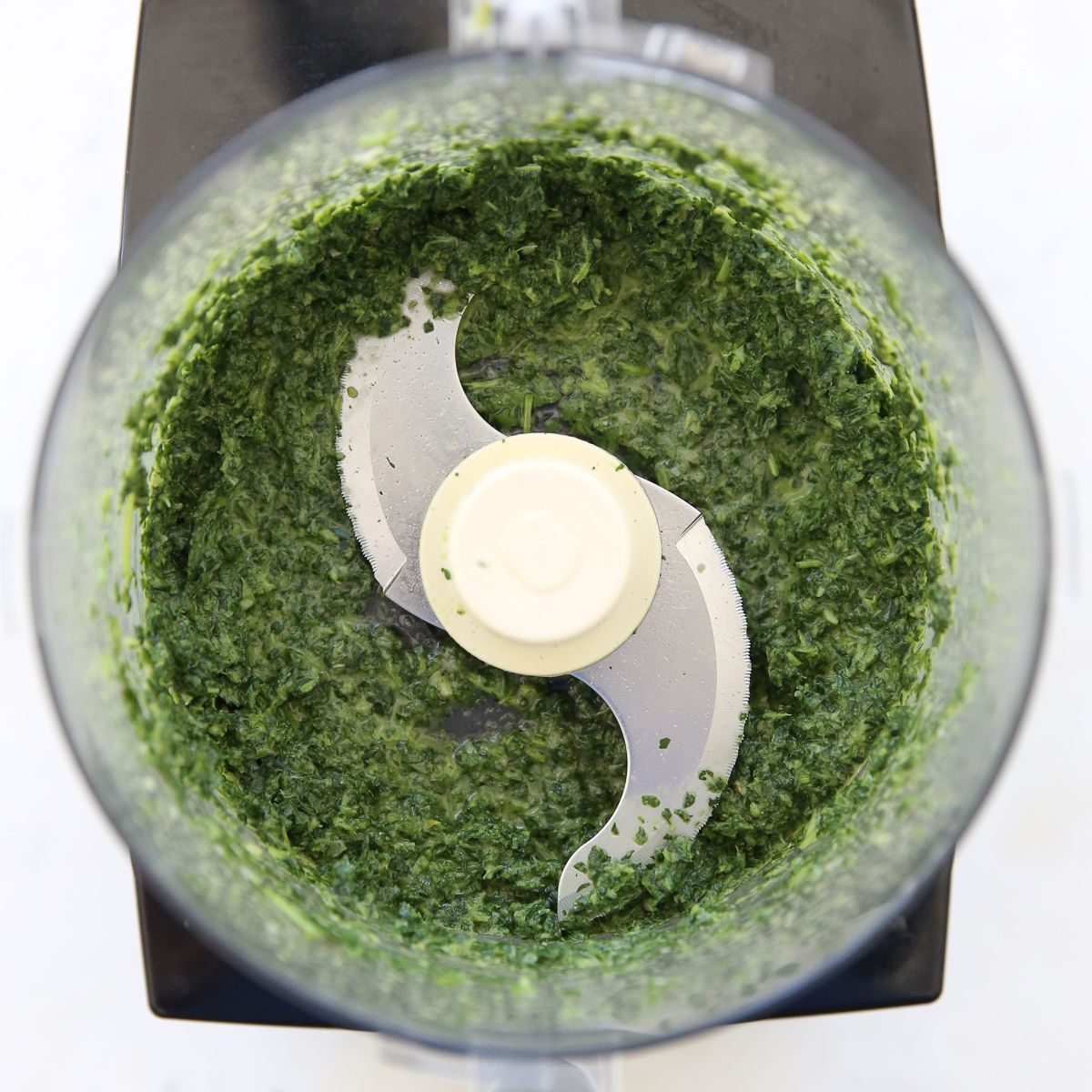 chimichurri ingredients in a food processor