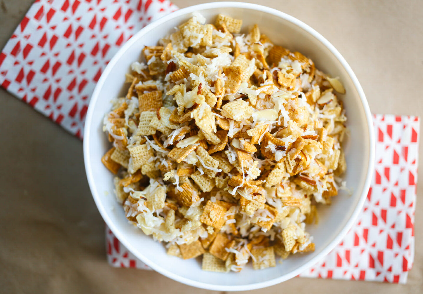 chewy almond chex mix in a bowl