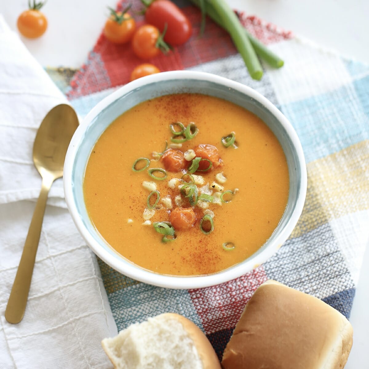 A bowl of roasted red pepper and tomato soup
