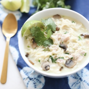 Creamy curry soup with noodles in a bowl