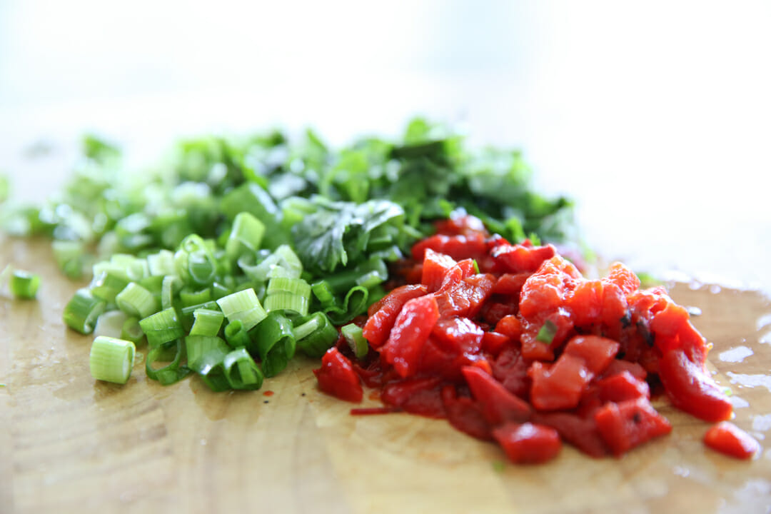 Chopped red bell peppers and onions