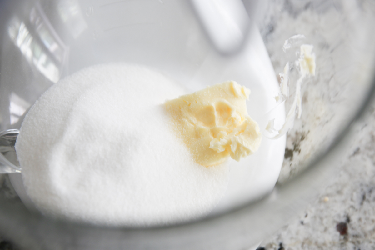 Butter and sugar in mixing bowl