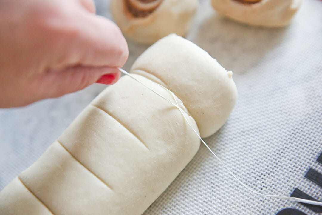 How to cut cinnamon roll dough with dental flosss