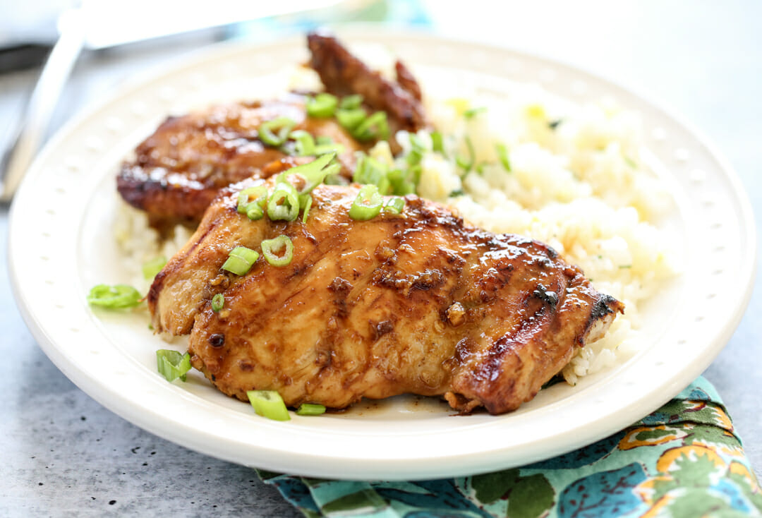 asian bbq chicken plated with rice