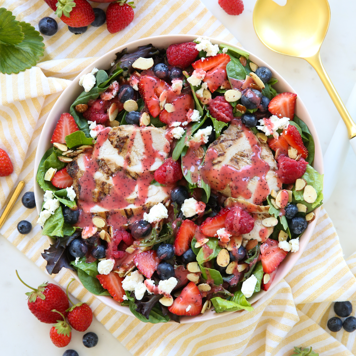 Salad in a bowl with pink dressing on top