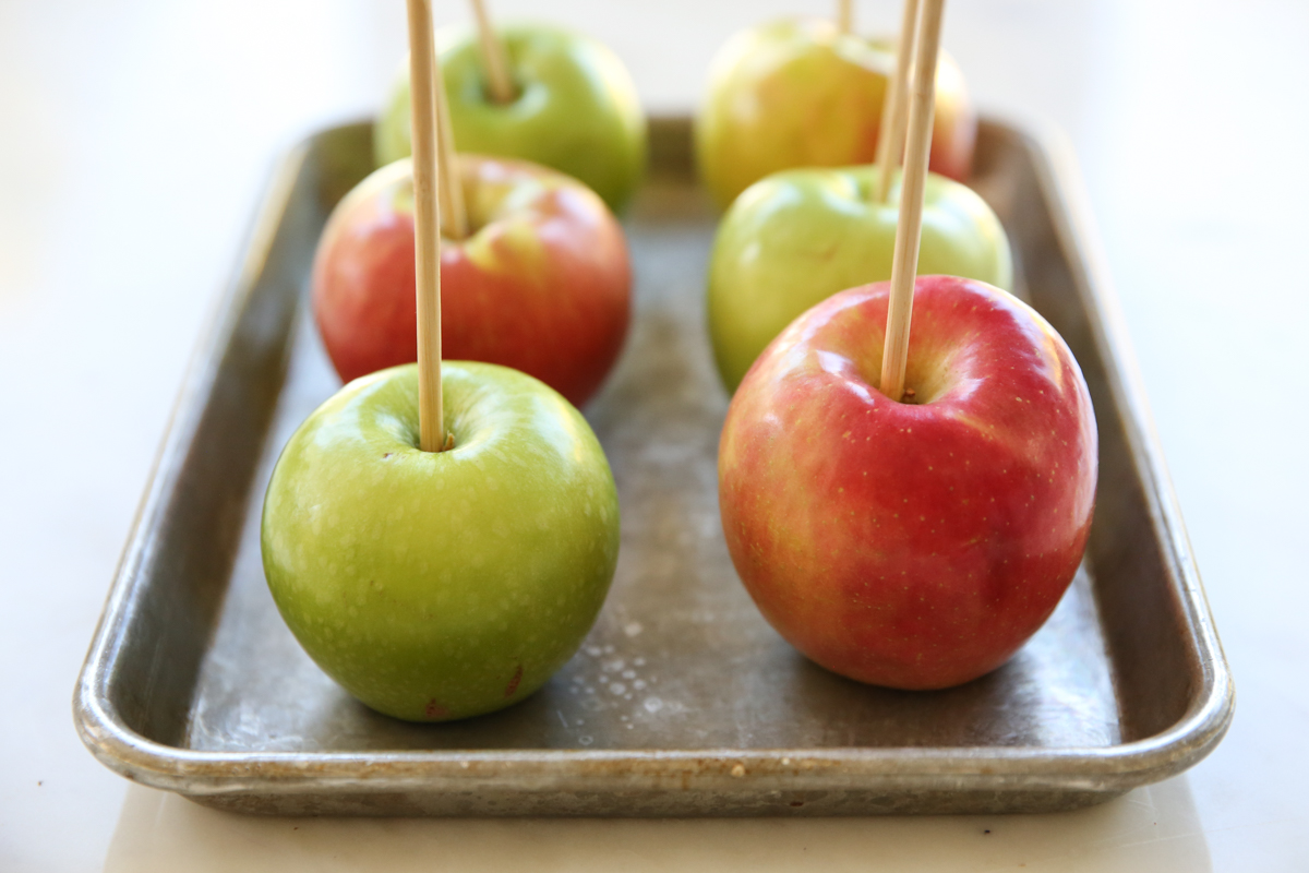 apples with sticks in the centers