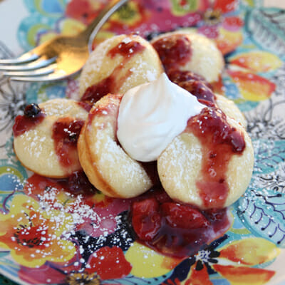 Mini Puffed Oven Pancakes with Berry Sauce