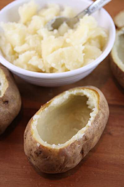 scooped and mashed baked potatoes