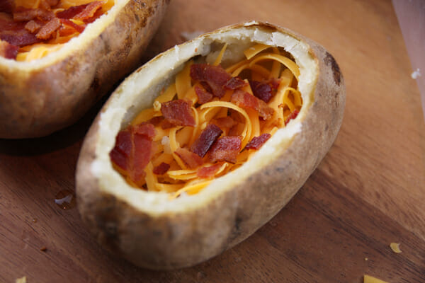 bacon and shredded cheese inside baked potatoes