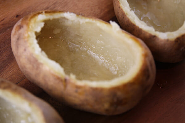 mleted butter brushed inside baked potatoes