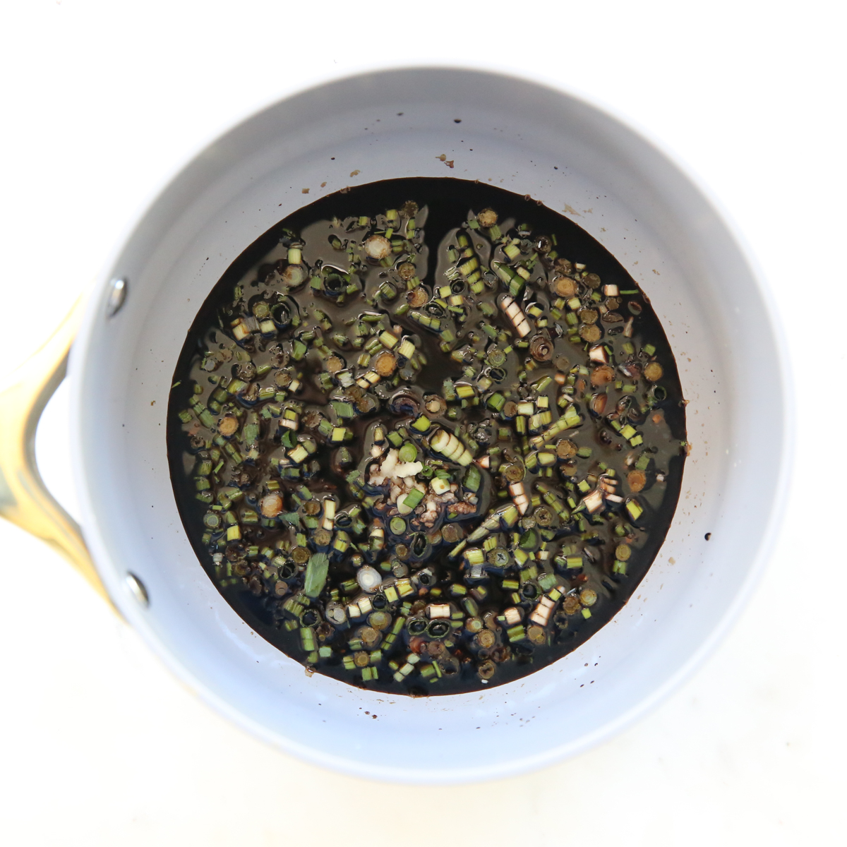 balsamic and butter reduction in a sauce pan