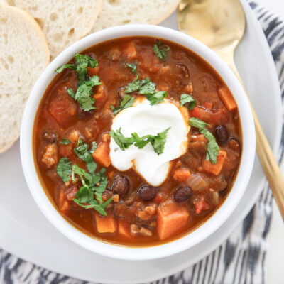 turkey black bean chili in a white bowl