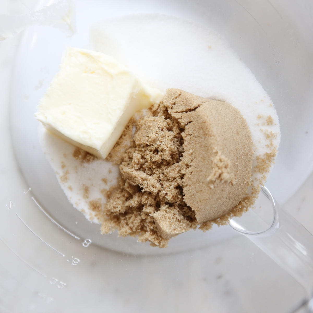 sugar and butter in mixing bowl
