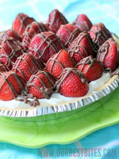 chocolate drizzled strawberries and cream pie