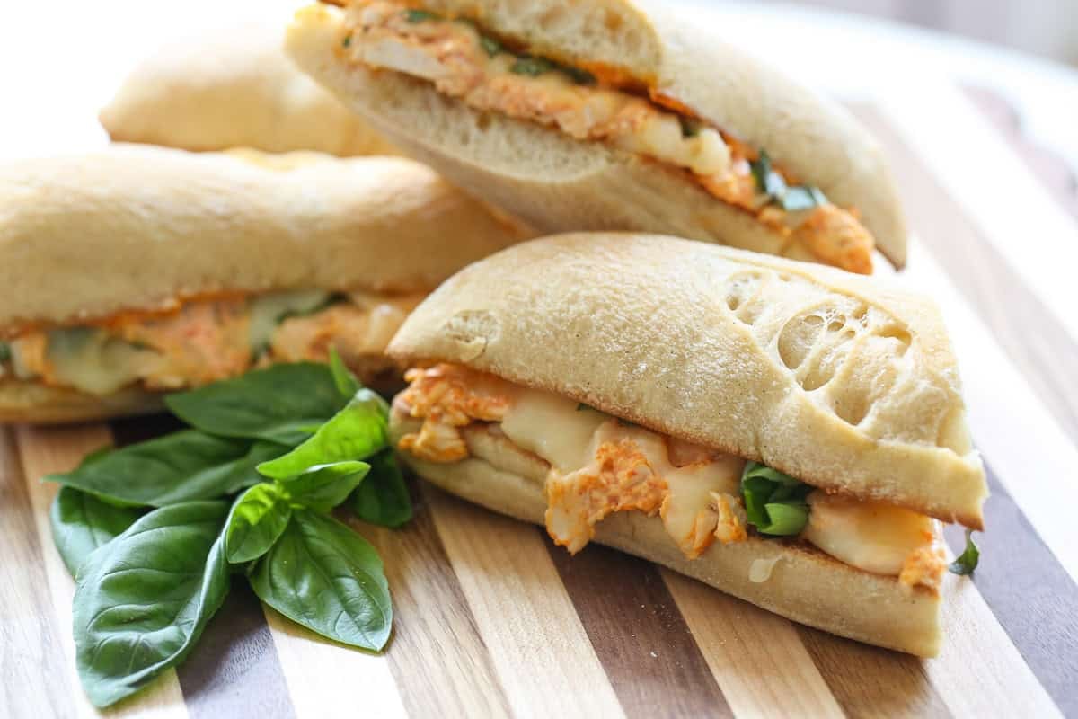 chicken hoagie sandwich on a cutting board