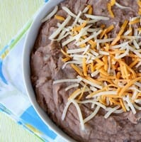 Slow cooker refried beans adapted by Our Best Bites from The Homesick Texan