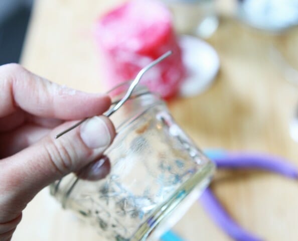 twisting the wire around the jar