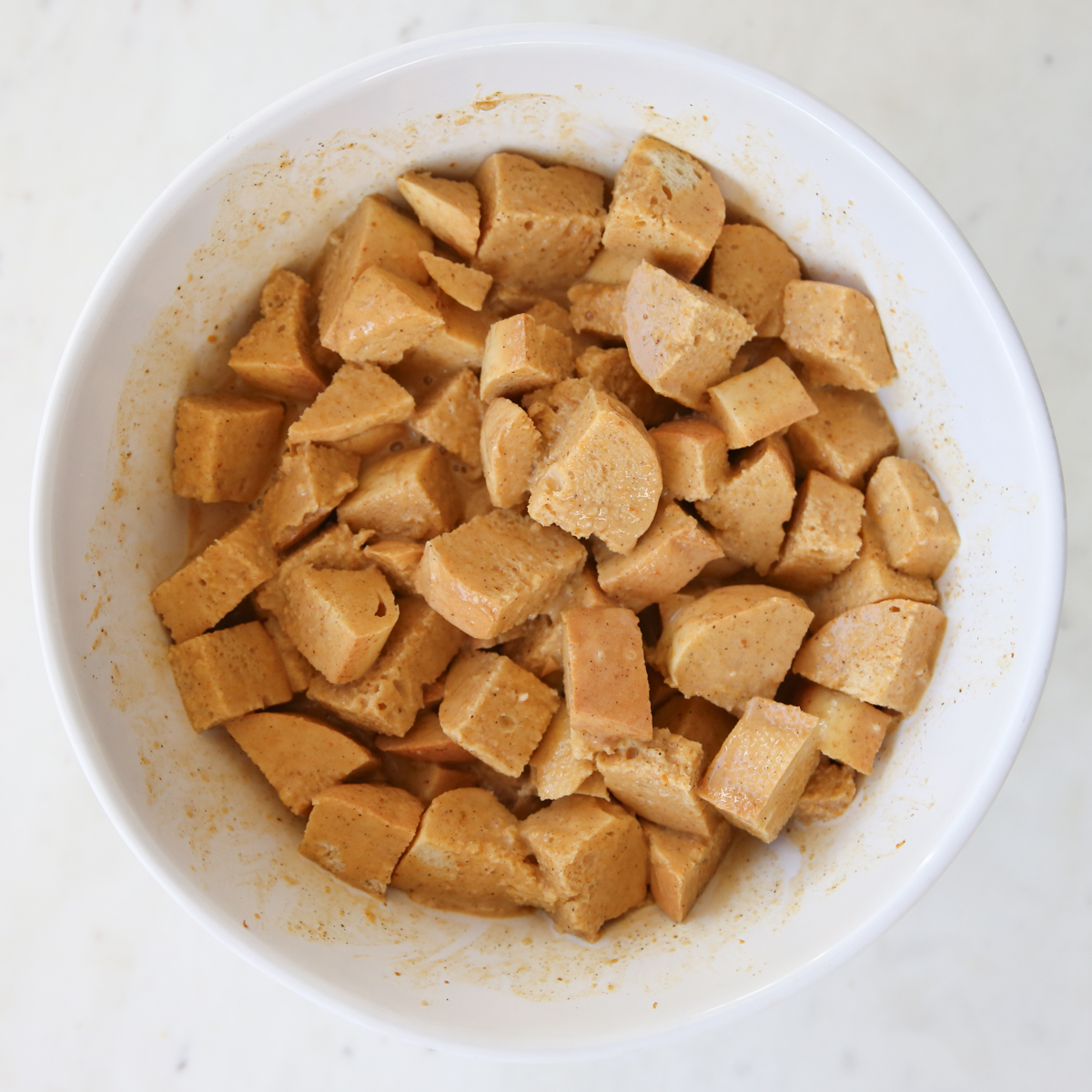 squares of bread dunked in custard mixture