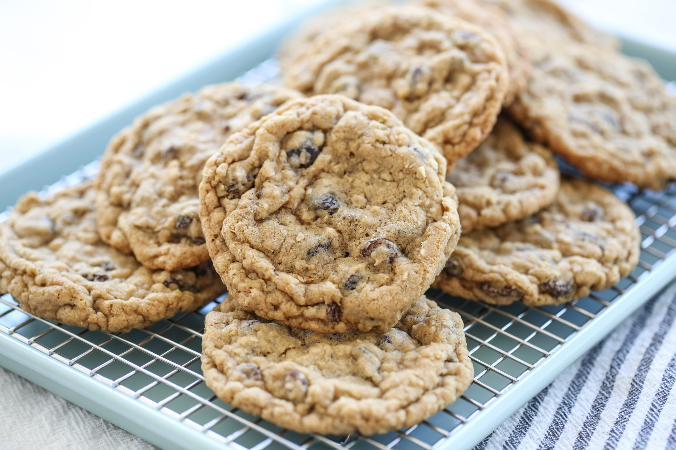 stack of oatmeal raisin cookies on a cooling rack