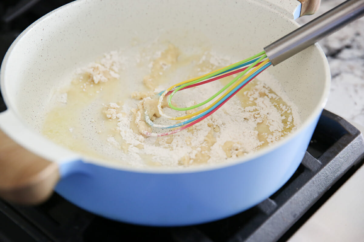 whisking flour and butter in pan