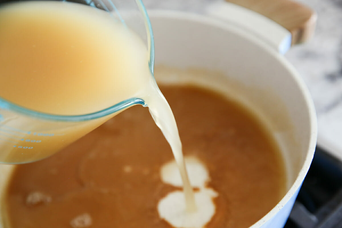 adding chicken stock to roux