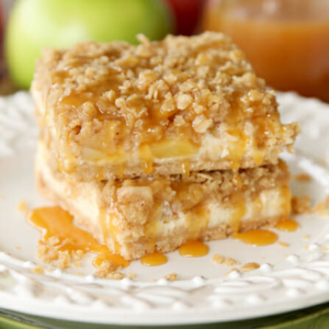 Caramel Apple Cheesecake Bars on a plate