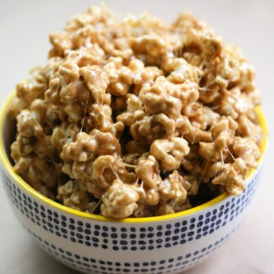 A bowl of gooey caramel corn.
