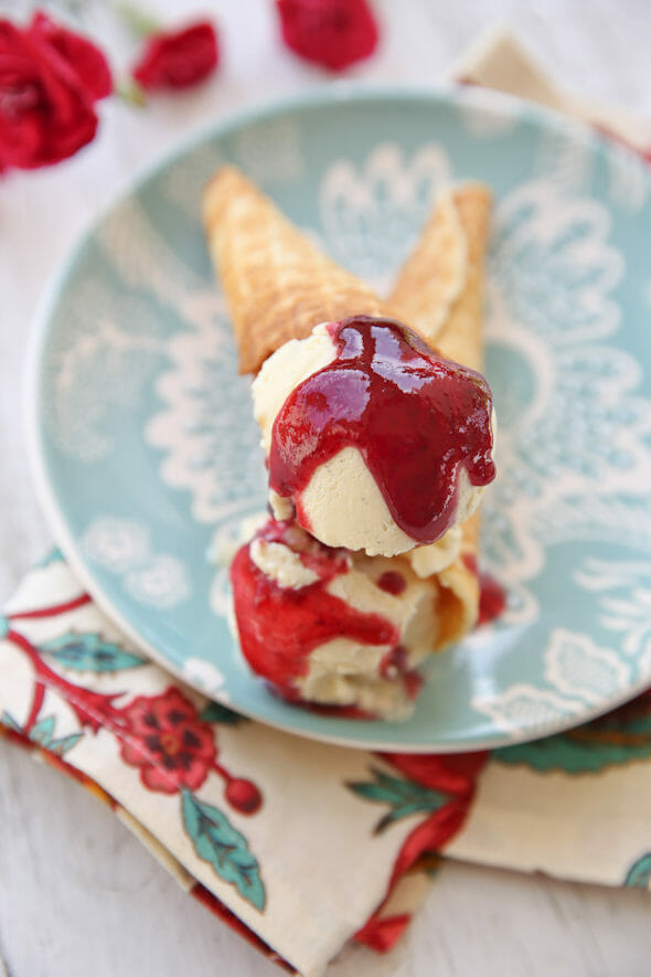 Buttermilk Ice Cream with Berry Sauce in homemade cones