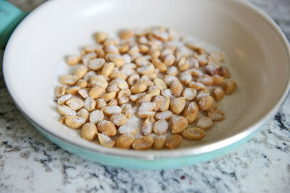 peanuts and sugar in pan