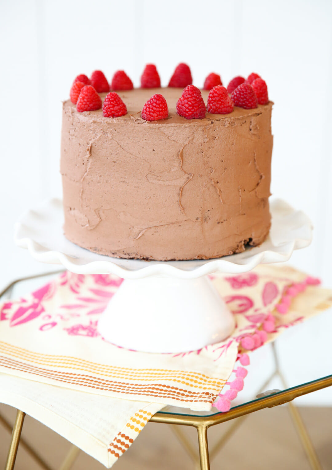 chocolate layer cake with raspberries