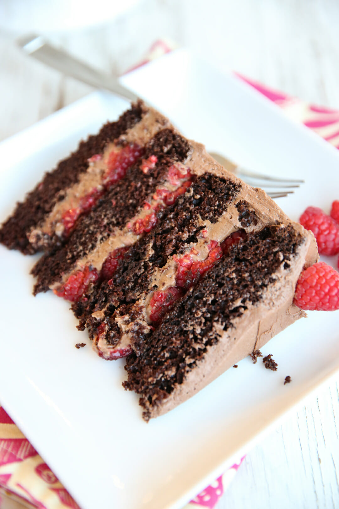 slice of chocolate raspberry layer cake
