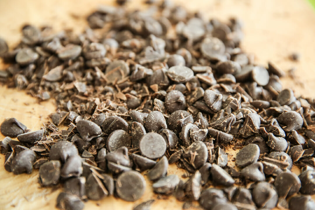 Chopped chocolate on cutting board