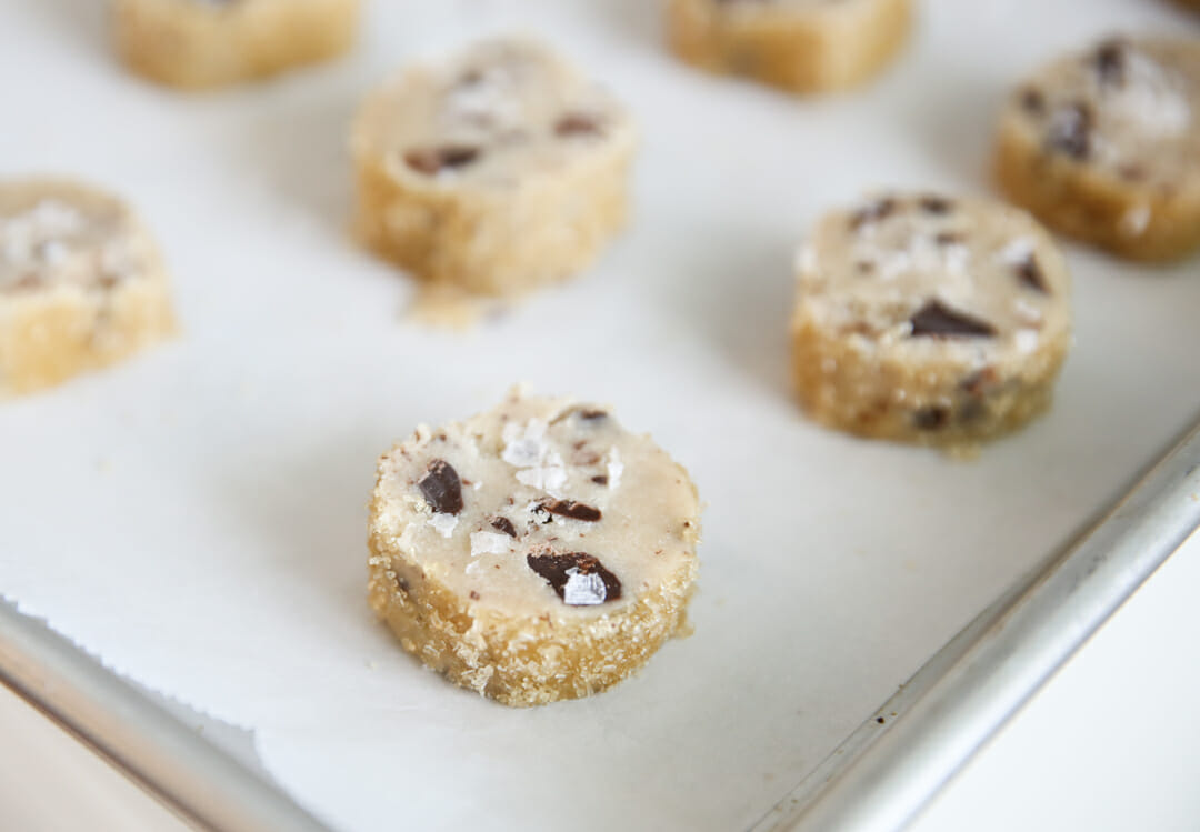 Shortbread cookie slices on baking sheet