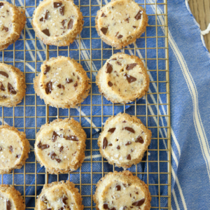 chocolate chunk shortbread cookies on rack