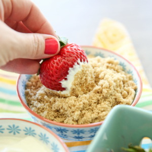 Dipping berries in sour cream and brown sugar