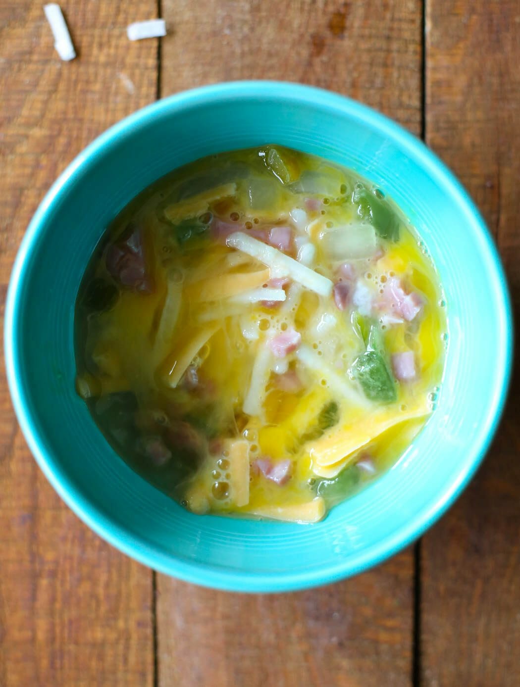 eggs, meat, and cheese for quick and easy egg scramble meal prep bowls