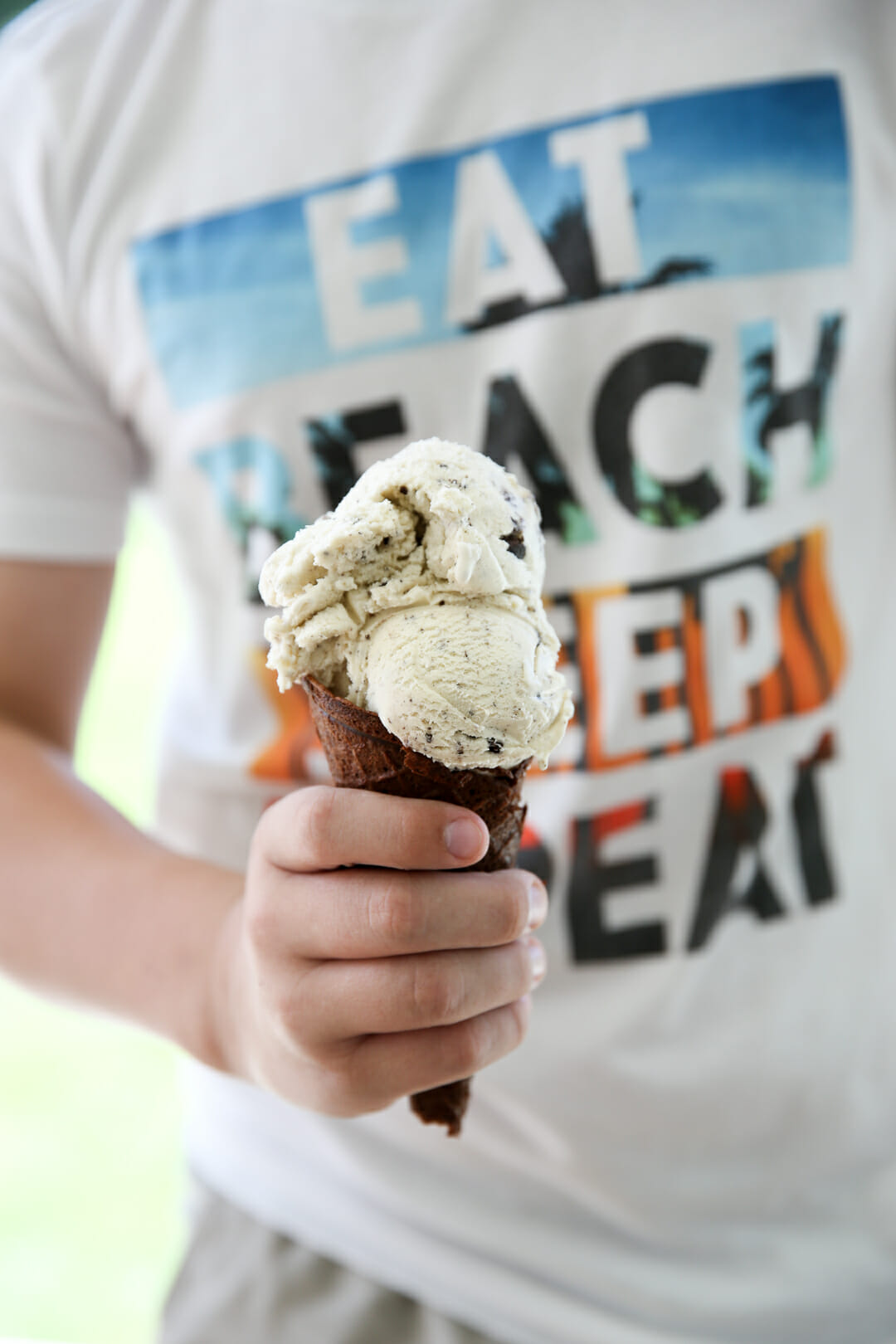 Child holding waffle cone