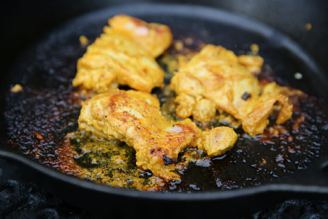 Tandoori Chicken Cooking in Skillet