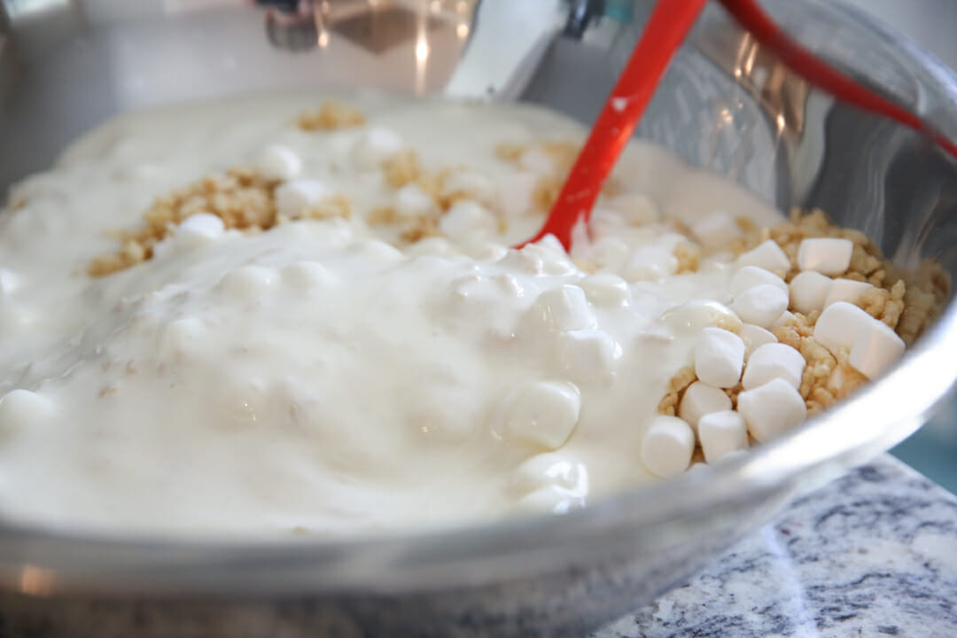 stirring rice krispie treats