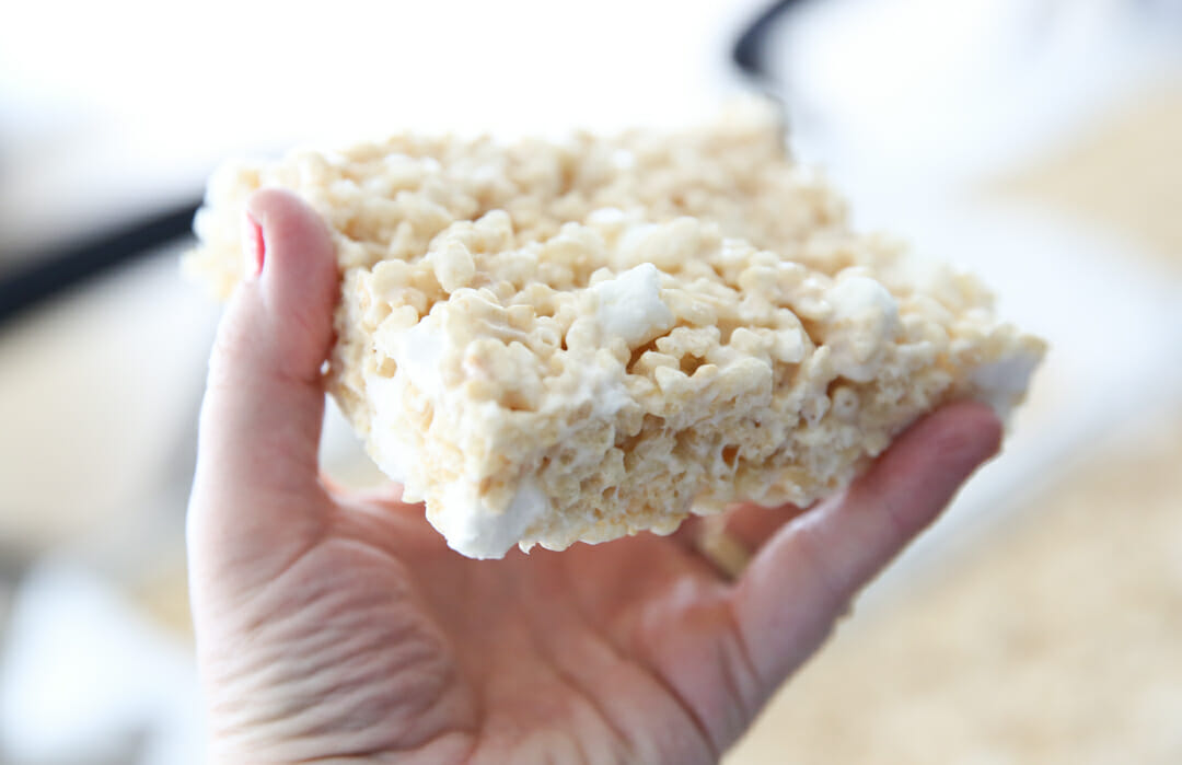 holding giant rice krispie treat