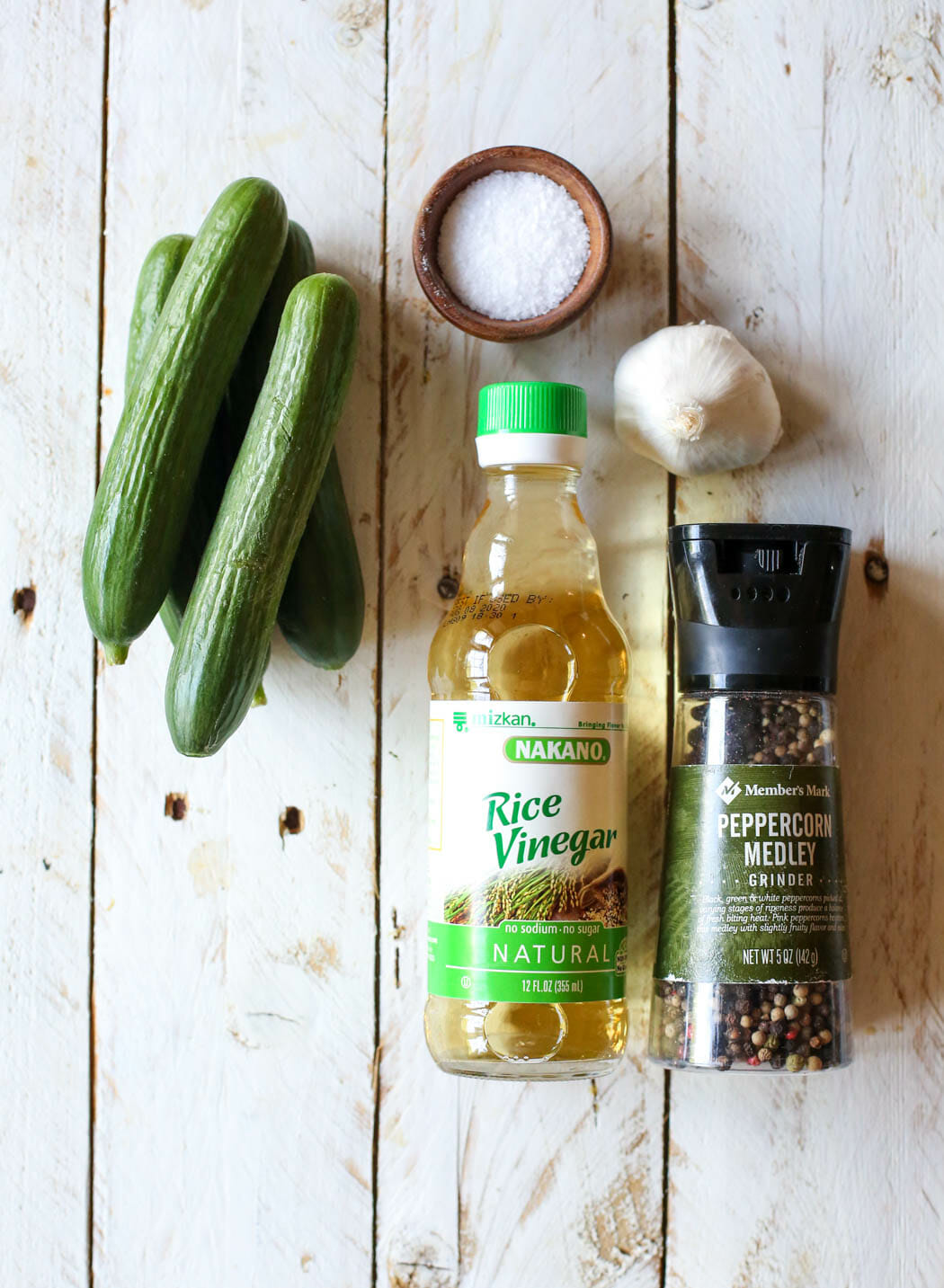 vinegar, salt, pepper, garlic, and cucumbers for quick pickles from our best bites