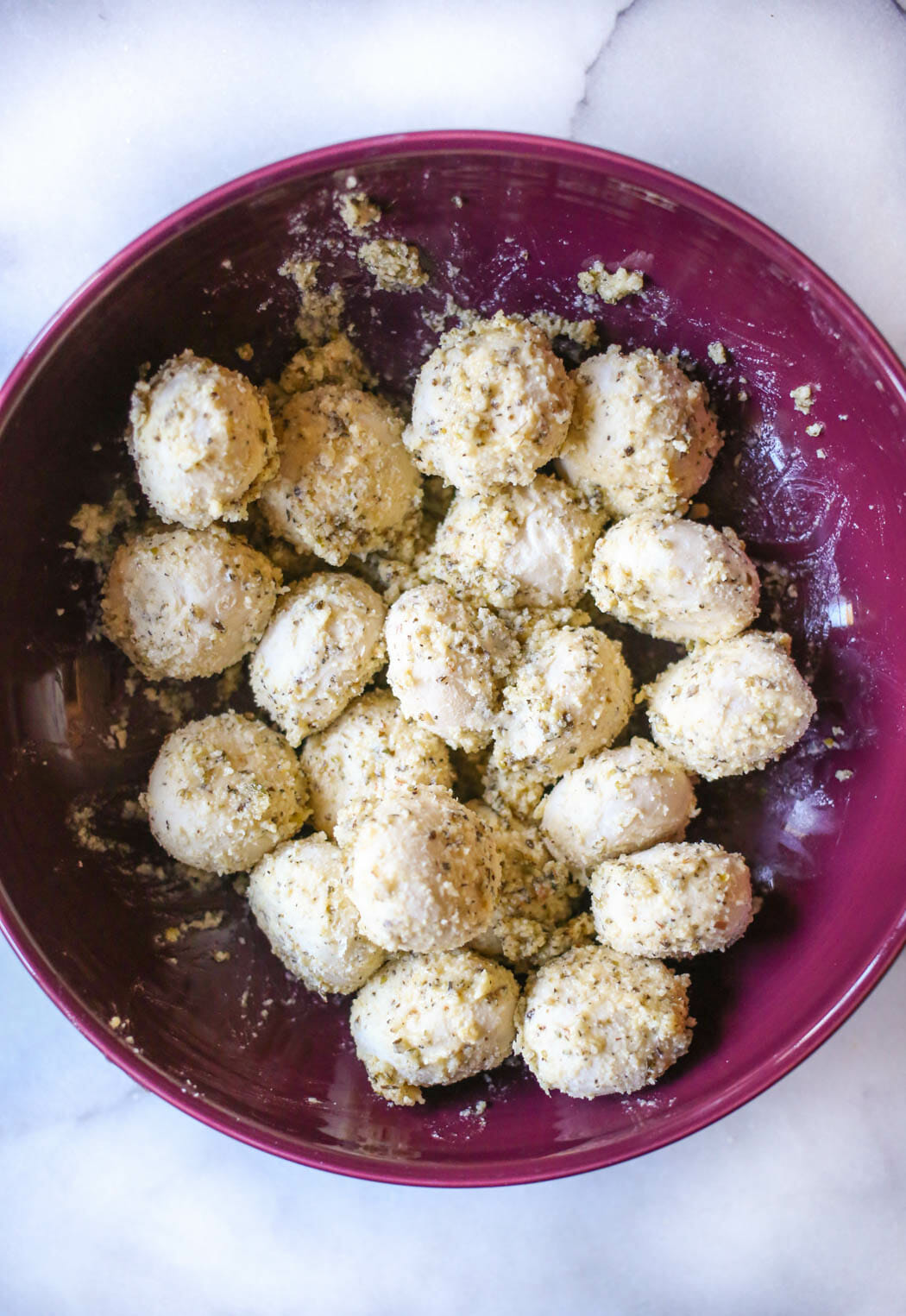 Frozen dough balls covered in garlic, butter, and parmesan cheese