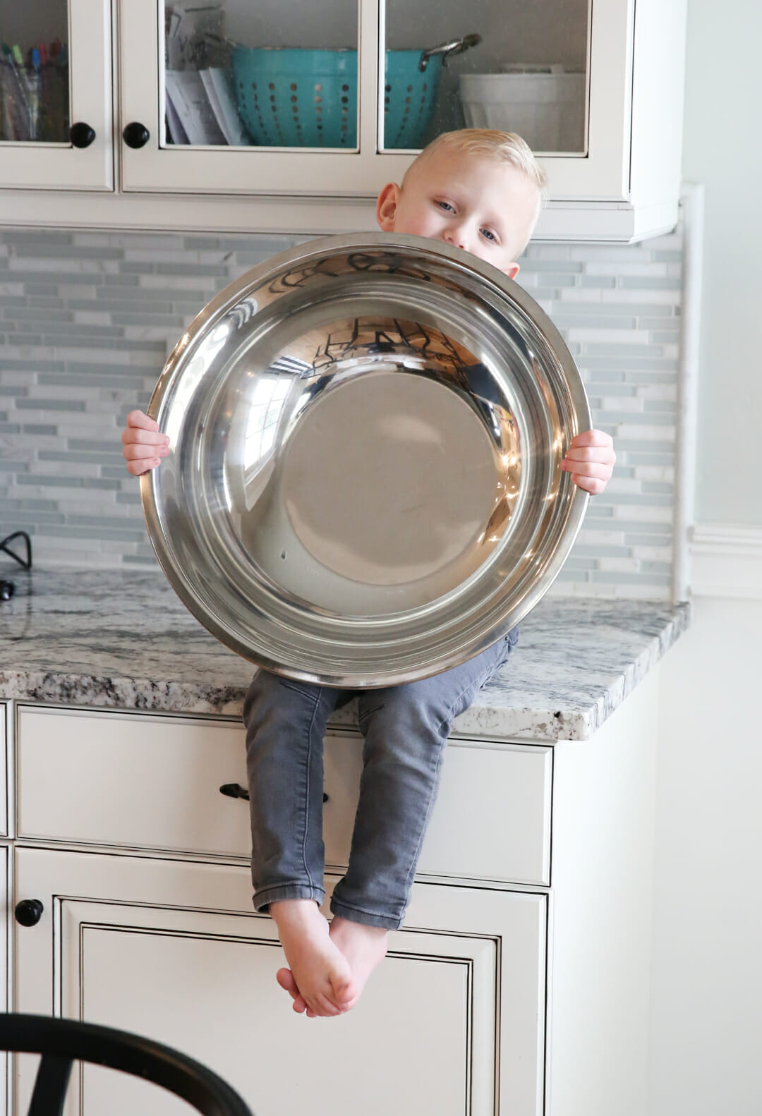 kid with giant mixing bowl